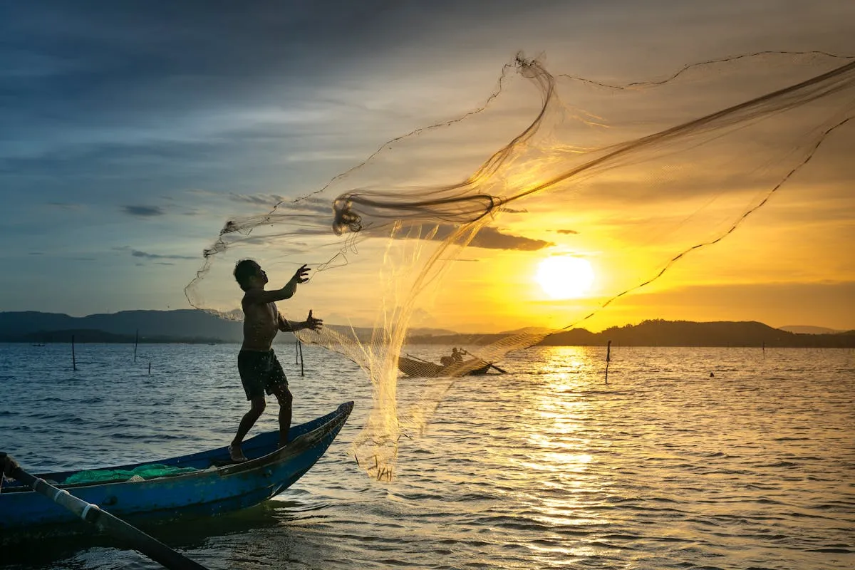A fisherman on a boat