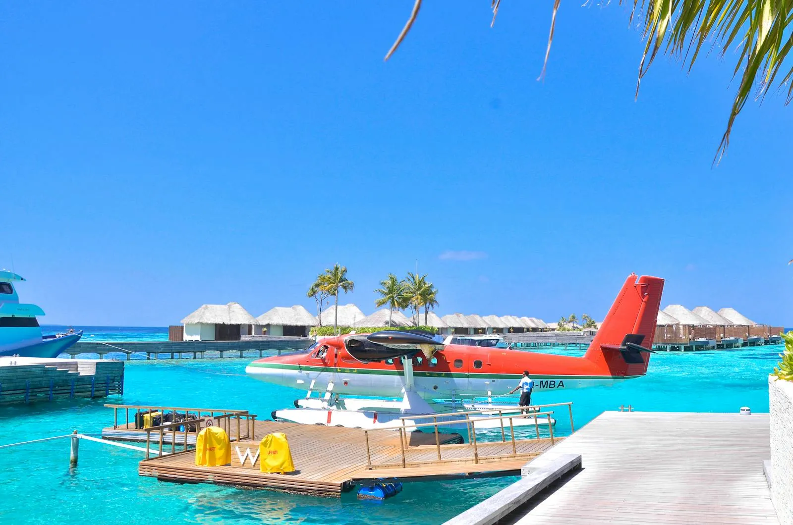 A seaplane docked at a Maldives jetty