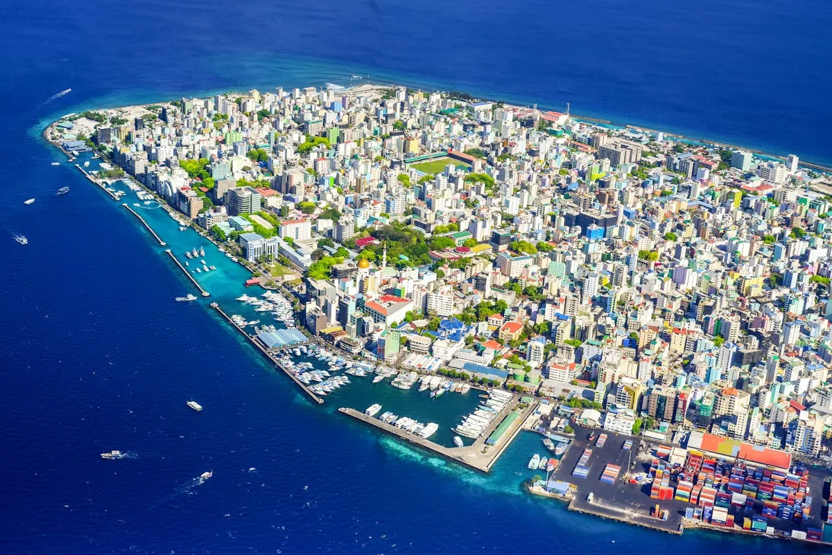 Aerial view of a coastline and harbour in the Maldives